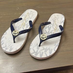 Michael Kors Women’s flip flops. Size 11